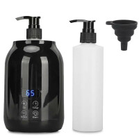 Scaldino elettrico per olio da massaggio con bottiglie di olio e imbuto