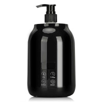 Scaldino elettrico per olio da massaggio con bottiglie di olio e imbuto